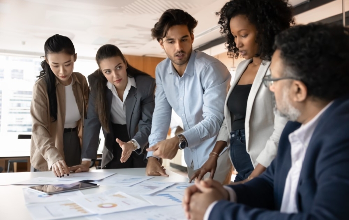 Workers discussing private health insurance benefits